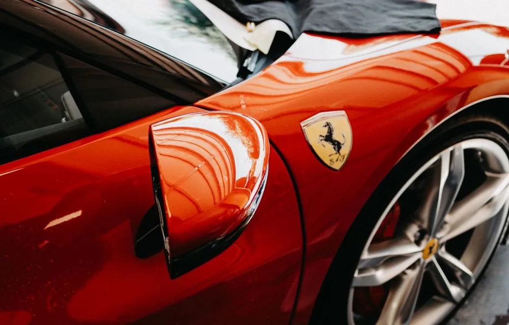 Car paint after machine polishing, with reflections sharp and even